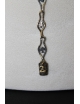 Collana lunga in argento e bronzo con medaglione centrale