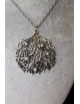 Collana con medaglione floreale e perline in argento