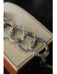 Bracciale a cerchi martellati in argento e bronzo