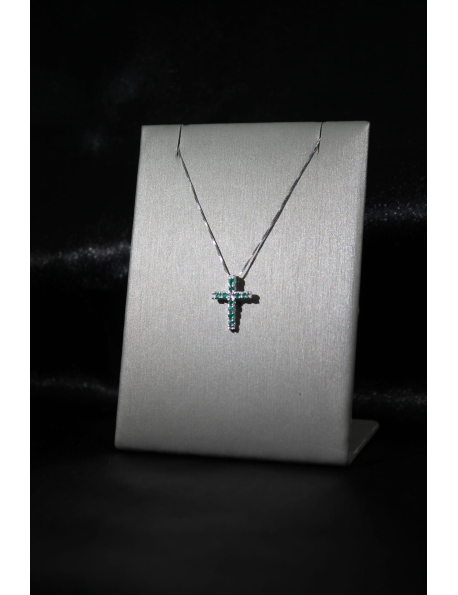 Croce in oro bianco con smeraldi e brillante