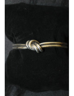Bracciale rigido in argento modello doppio nodo