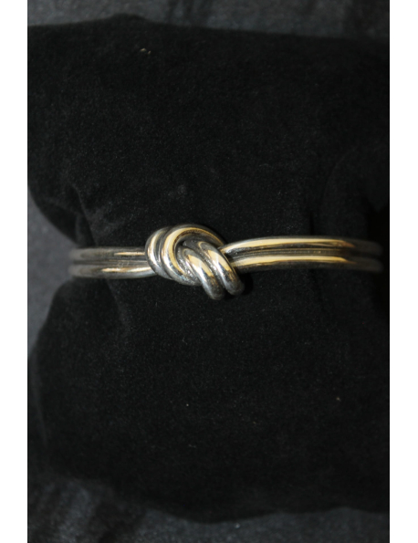 Bracciale rigido in argento modello doppio nodo
